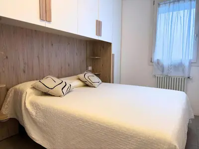 Letto o letti in una camera di Condominio Oderzo - Home Immobiliare