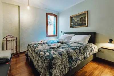 Letto o letti in una camera di Palazzino Veneziano - Charme in the Serenissima