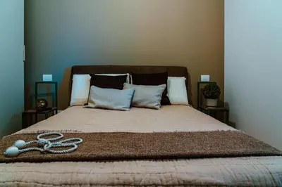 Letto o letti in una camera di Alloggi Celly Appartamento piano terra