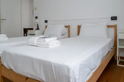 Letto o letti in una camera di Welc-ōM Montegrotto Terrace View