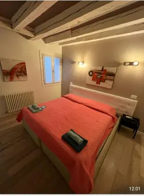 Letto o letti in una camera di Rialto Rooms very central
