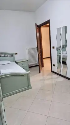 Letto o letti in una camera di Carossa Apartment