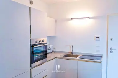 Cucina o angolo cottura di Jesolo Wave - Private Garden & Pool Retreat