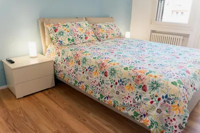 Letto o letti in una camera di Lucky apartment Vicenza centro e parcheggio gratuito