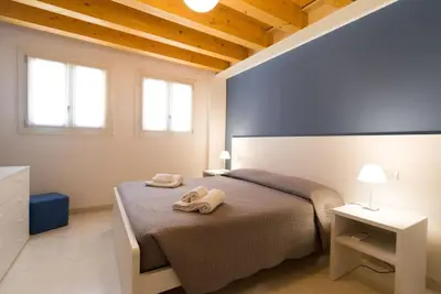 Letto o letti in una camera di Ca' Martina