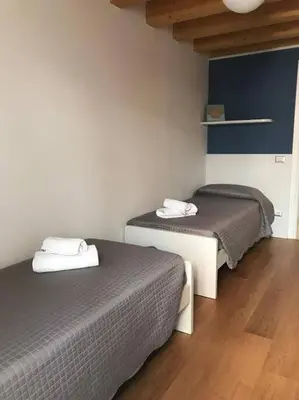 Letto o letti in una camera di Ca' Martina