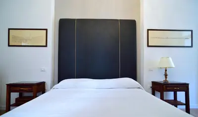 Letto o letti in una camera di San Giacomo Apartment