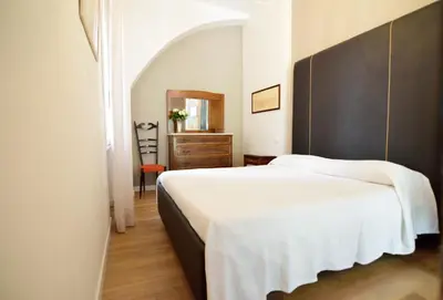 Letto o letti in una camera di San Giacomo Apartment