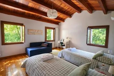 Letto o letti in una camera di B&B Villa Euganea