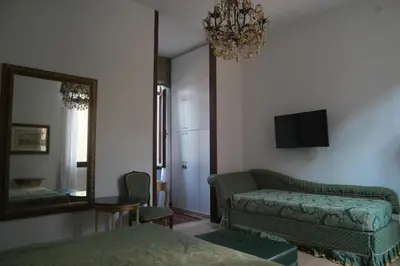 TV o dispositivi per l'intrattenimento presso Savoia e jolanda Apartments
