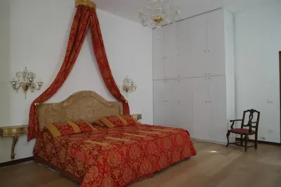 Letto o letti in una camera di Savoia e jolanda Apartments