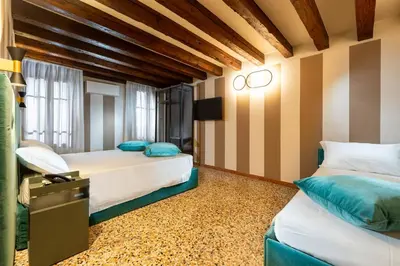 Letto o letti in una camera di Ca' San Geremia