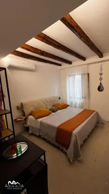 Letto o letti in una camera di Aqua Alta