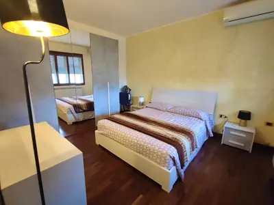 Letto o letti in una camera di Ca' Gabriella