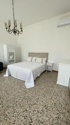 Letto o letti in una camera di Residenza Stardust Suite with Canal View