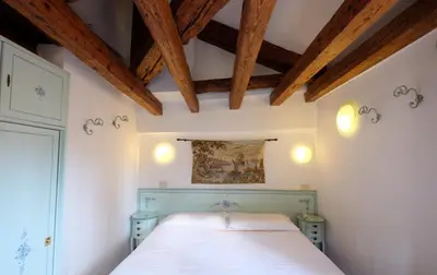 Letto o letti in una camera di Hotel ai do Mori