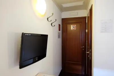 TV o dispositivi per l'intrattenimento presso Hotel ai do Mori