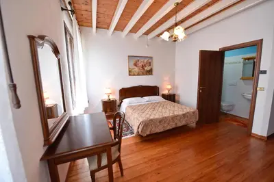 Letto o letti in una camera di B&B Kiwi
