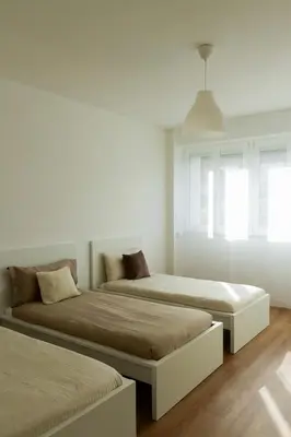 Letto o letti in una camera di Corso 73 - Accogliente appartamento a Mestre-VE