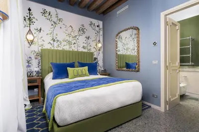 Letto o letti in una camera di La Dimora di Lady J Amazing Brandnew property with 6 luxury bedrooms!