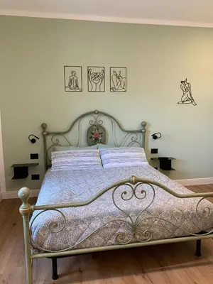 Letto o letti in una camera di La casa di Elena
