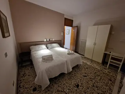 Letto o letti in una camera di Albergo D'Ambros - Casa Belfiore Group
