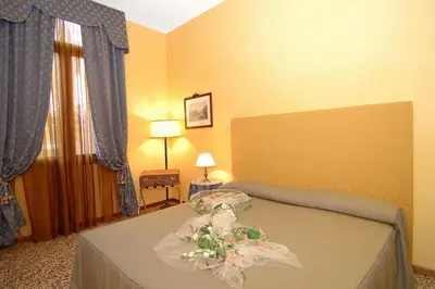 Letto o letti in una camera di Residence Odoni