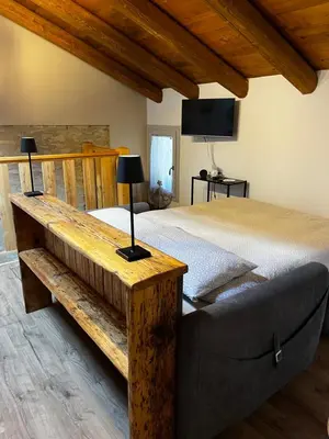 Letto o letti in una camera di Monolocale Giuggiola