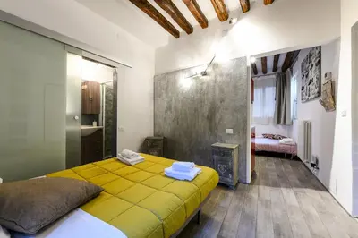 Letto o letti in una camera di La Perla