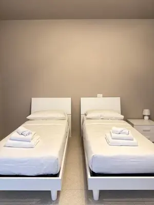 Letto o letti in una camera di Ca' Monte 2 - Dimora Centrale 2 camere