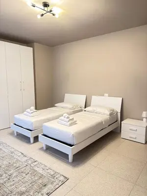 Letto o letti in una camera di Ca' Monte 2 - Dimora Centrale 2 camere