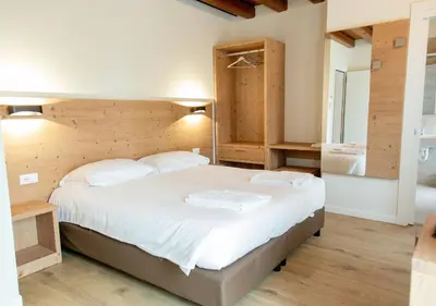 Letto o letti in una camera di AL Borgo