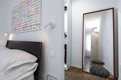 Letto o letti in una camera di Venetian Alcove