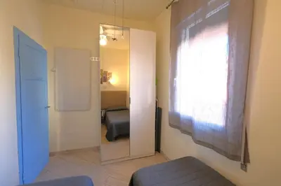 Letto o letti in una camera di CASA ROSSA tre camere in centro
