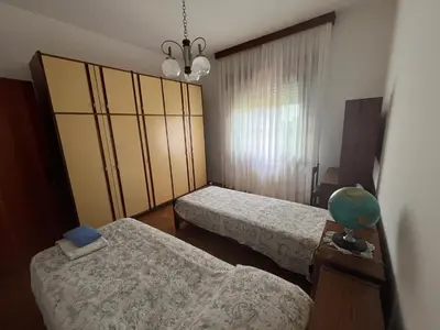 Letto o letti in una camera di casa Giovanna