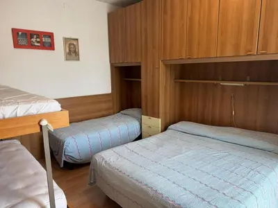 Letto o letti in una camera di Beachfront apartment free park - Jesolo beach