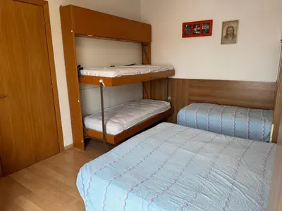 Letto o letti in una camera di Beachfront apartment free park - Jesolo beach