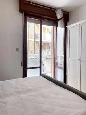 Letto o letti in una camera di Fronte Mare Apartment Private Beach & Free Park