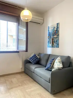 Area soggiorno di Fronte Mare Apartment Private Beach & Free Park