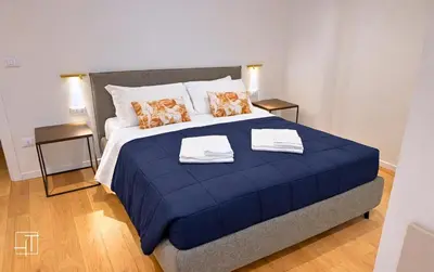 Letto o letti in una camera di HT - Basilica View Luxury Loft