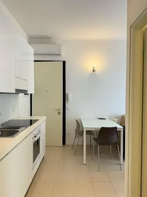 Cucina o angolo cottura di VILLA SMERALDA-Solo per famiglie- WALTERIGATO APARTMENTS