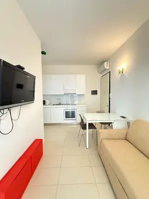 Cucina o angolo cottura di VILLA SMERALDA-Solo per famiglie- WALTERIGATO APARTMENTS