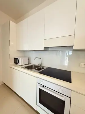 Cucina o angolo cottura di VILLA SMERALDA-Solo per famiglie- WALTERIGATO APARTMENTS