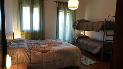 Letto o letti in una camera di Casa della Nonna Rooms