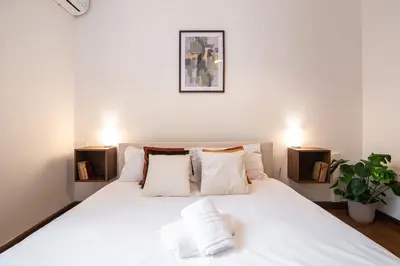 Letto o letti in una camera di Grand Billiard Exclusive Home