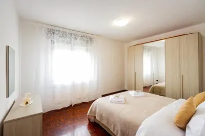 Letto o letti in una camera di Liviana Apartment