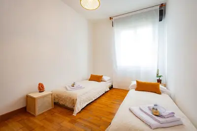 Letto o letti in una camera di Liviana Apartment