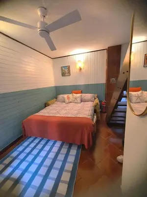 Letto o letti in una camera di Ca' del Bovolo