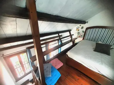 Letto o letti in una camera di Ca' del Bovolo