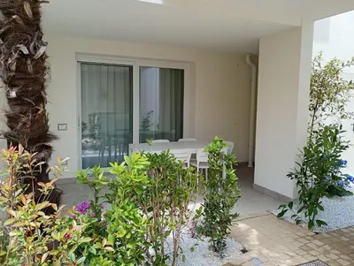 Giardino di Residence Florinas con piscina - Family Apartments Lido di Jesolo